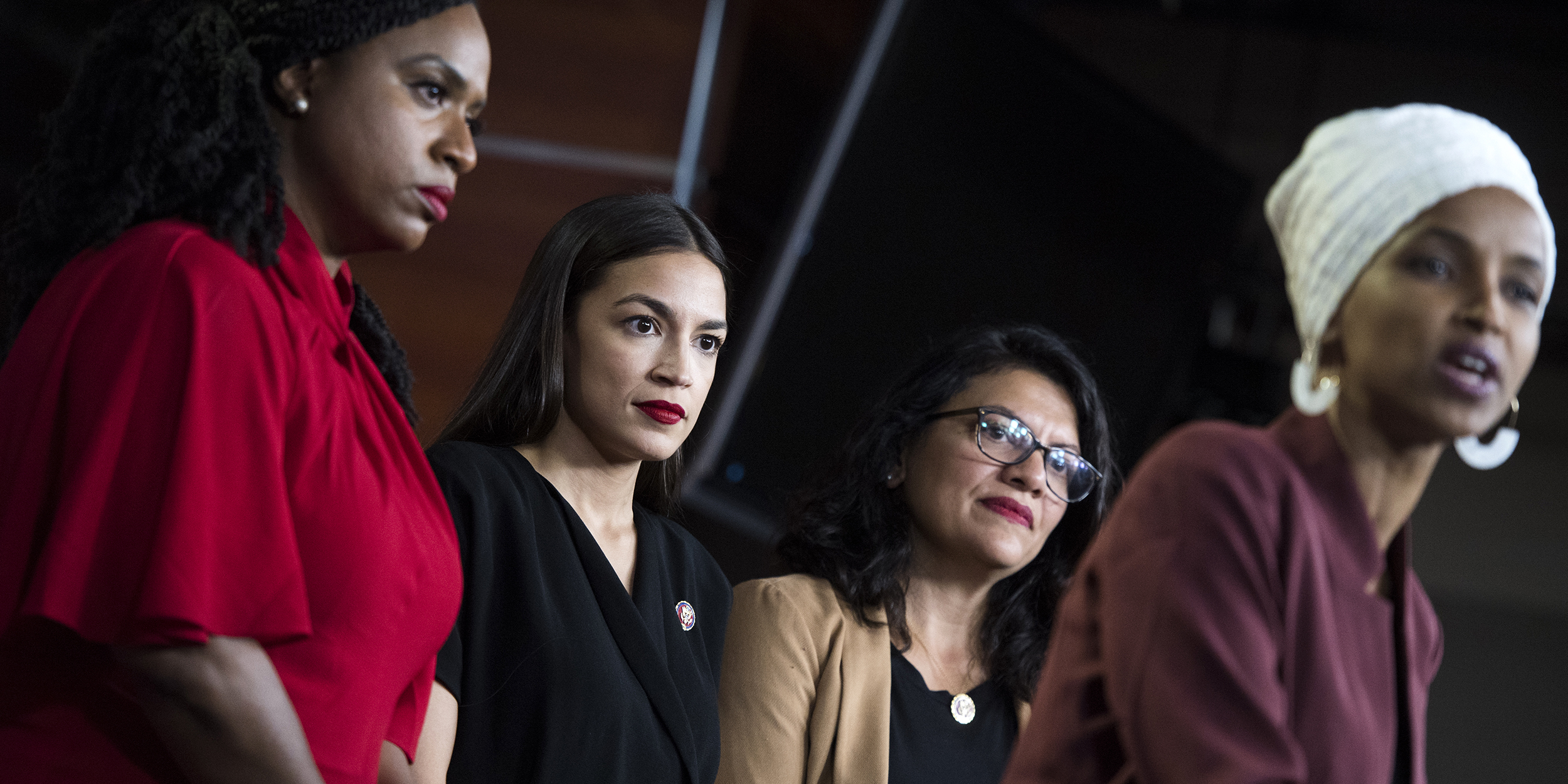 UNITED STATES - JULY 15: From left, Reps. Ayanna Pressley, D-Mass.,  Alexandria Ocasio-Cortez, D-N.Y., Rashida Tlaib, D-Mass., and Ilhan Omar, D-Minn., conduct a news conference in the Capitol Visitor Center responding to negative comments by President Trump that were directed the freshman House Democrats on Monday, July 15, 2019. (Photo By Tom Williams/CQ Roll Call)