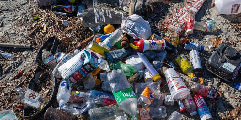 Seal Beach, CA - December 13: Plastic bottles and other trash is piled up along the bank of the San Gabriel River just a few hundred yards from the Pacific Ocean in Seal Beach on Tuesday morning, December 13, 2022. Recent heavy rains have sent trash flowing down the river from many miles inland. (Photo by Mark Rightmire/MediaNews Group/Orange County Register via Getty Images)
