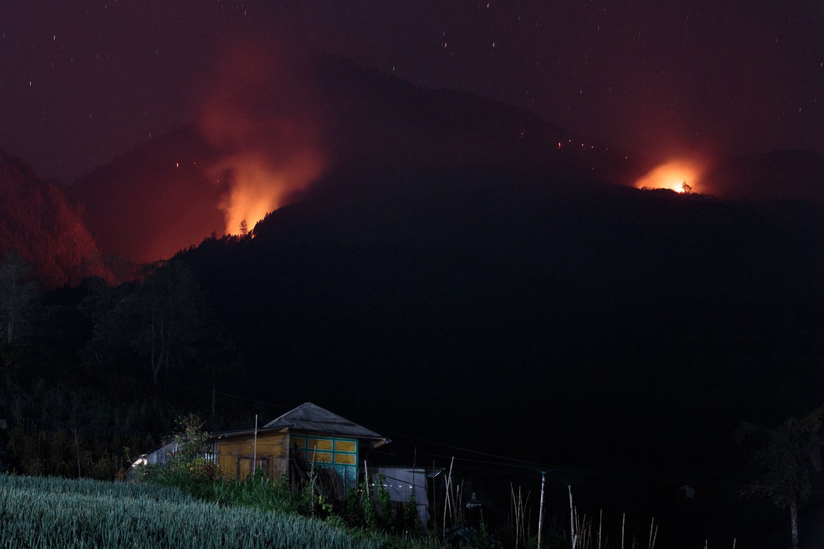 A picture taken on October 6, 2023 shows a forest fire spreading for nine days due to the dry season and high temperatures in the Lawu mountain area in Karanganyar, Central Java. (Photo by DEVI RAHMAN / AFP) (Photo by DEVI RAHMAN/AFP via Getty Images)