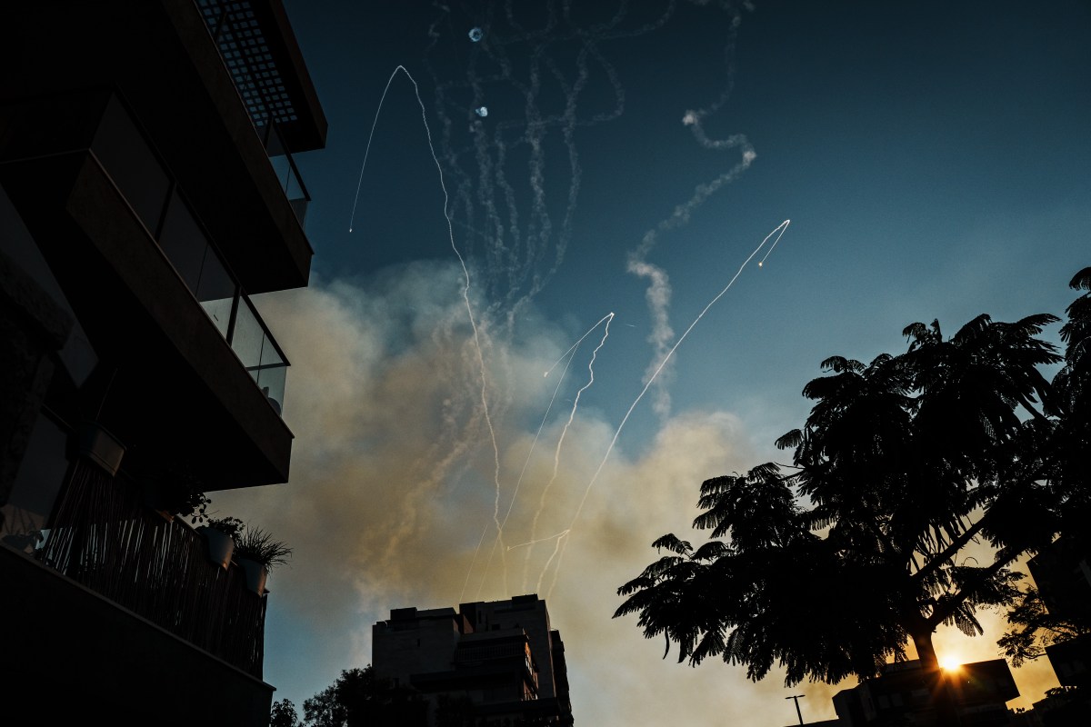 ASHKELON, ISRAEL -- OCTOBER 10, 2023: Hamas rockets are intercepted by counter-battery fire from the Iron Dome over the skies of Ashkelon, Israel, Tuesday, Oct. 10, 2023. Last week, Israel was caught by surprise after Hamas cross Israeli border and launched a multi-pronged attack which led to the deadliest bout of violence to hit Israel in 50 years that has taken more than a thousand lives on both sides. (MARCUS YAM / LOS ANGELES TIMES)