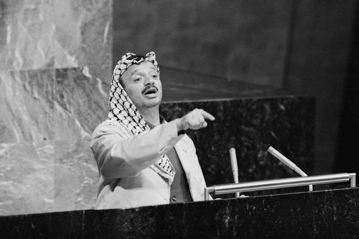 (Original Caption) UNITED NATIONS: Yasser Arafat, head of the Palestine Liberation Organization, addresses the United Nations General Assembly November 14. He said he was dreaming of "one Democratic state where Christian, Jew and Moslem live in justice, equality and fraternity."