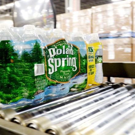 Packaged bottles of Poland Spring water on a conveyer belt, 2016.